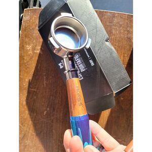 Bottomless (Naked) Espresso Portafilter with a Wooden Handle.